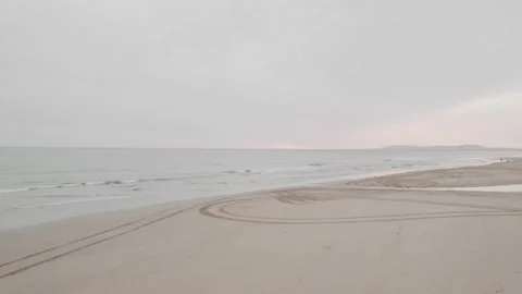 Drone view of sandy empty beach on a sunset, Portugal Stock Footage 232485597