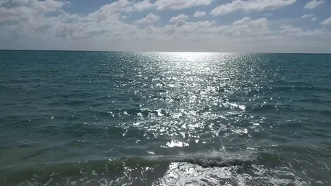 Drone View from Sandy Shore to Sea at Barbary Beach, Grand Bahama Stock Footage 100444210