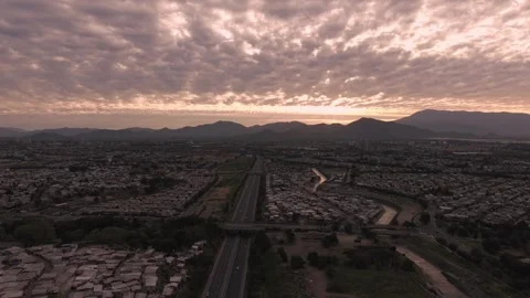 Drone View of Santiago Chile at Sunset with Andes Mountains and Clouds Stock Footage 336760479