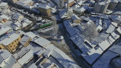 Drone view of Sarajevo, Sebilj, Bascarsija, tram - Snow covered Sarajevo Stock Footage