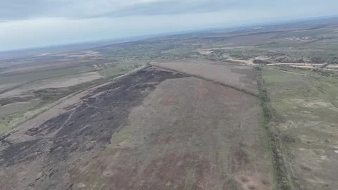 Drone View: Scouting Treelines and Shell-Damaged Fields Stockbeeldmateriaal 332354774