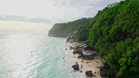 Drone view of sea wave and cliff, sunset shore in Bali, 2K Stock Footage 246163201