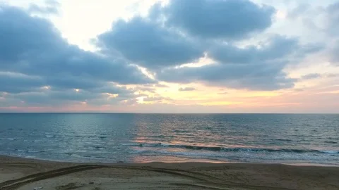 Drone View Of Sea Wave Breaking At Sunset, Sun Shining On Water v3 Stock Footage 100128996
