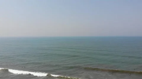Drone view of sea waves breaking on sandy coastline Arambol Goa, India Asia 스톡 동영상 132246172