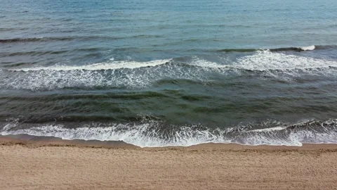 Drone view to the sea waves. Cloudy, stormy weather. Black Sea. Sand beach. Stock Footage 160596842