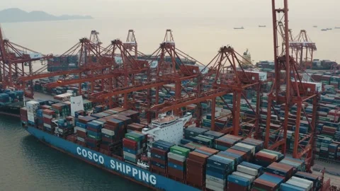 Drone view of shipping containers in a busy port at night Stock Footage 163691741