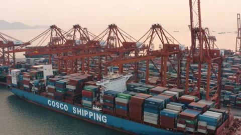 Drone view of shipping containers in a busy port at night Stock Footage 163691924
