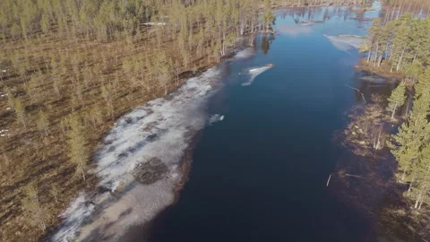 Drone view shows a river releasing ice Stock Footage 332349125