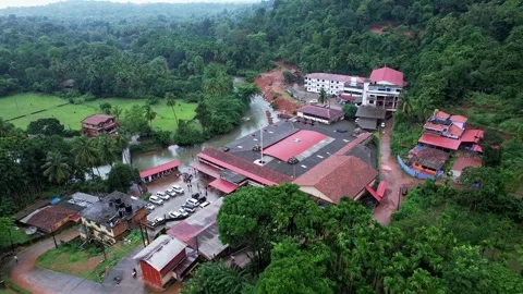 A drone view of Shri Durga Parameshwari Hindu pilgrimage temple at natural .. Stock-Footage 344353216