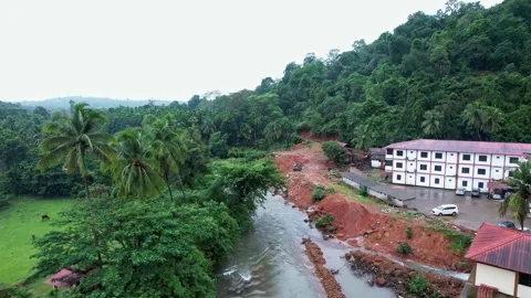 A drone view of Shri Durga Parameshwari Hindu pilgrimage temple at natural .. Stock-Footage 344353328