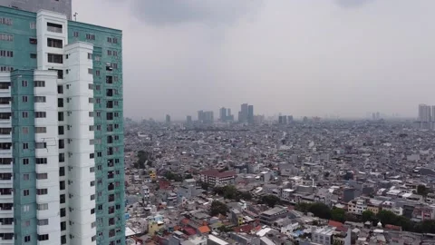 Drone view of skyline and tower block in Jakarta, Indonesia Stock Footage 264769917