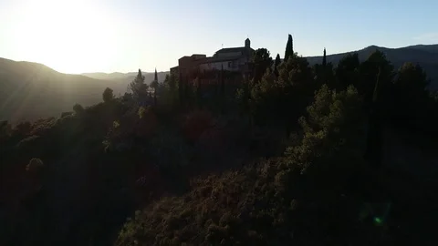 Drone view of small romanic hermitage of the 16th century at sunset Stock Footage 116054873