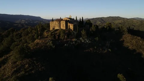 Drone view of small romanic hermitage of the 16th century at sunset Stock Footage 116055228