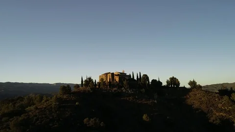 Drone view of small romanic hermitage of the 16th century at sunset Stock Footage 116055378