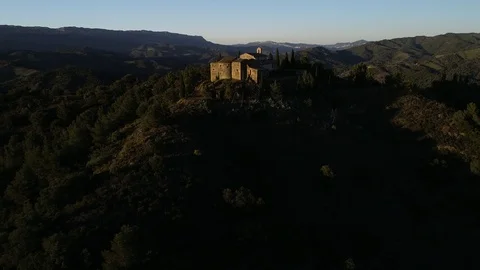 Drone view of small romanic hermitage of the 16th century at sunset Stock Footage 116055472