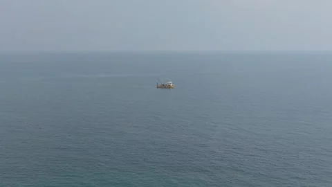 Drone view of small ship floating in calm open sea Stock Footage 320990353