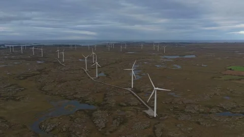 Drone view of Smola wind farm surrounded by wild coastal landscape Stock Footage 320577182