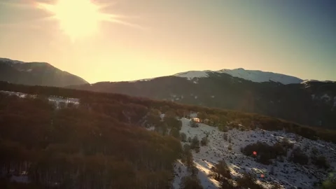 Drone view of snow capped peaks. Clear blue sky and sunny weather. Snow lies on Video stock 202030616