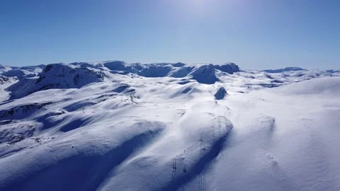 Drone View of a Snow Covered Vikafjell, Norway. Aerial view with a mountain road Stock Footage 234513646