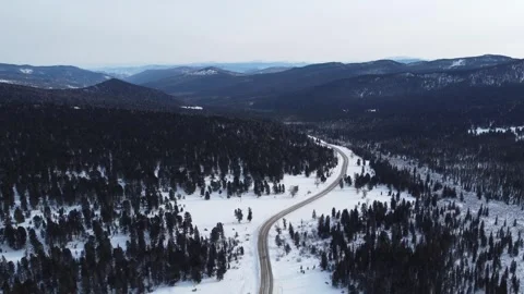 Drone View of Snowy Road to Ust-Koksa in Russia Stock Footage 313233868