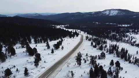 Drone View of Snowy Road to Ust-Koksa in Russia Stock Footage 313233944
