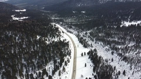 Drone View of Snowy Road to Ust-Koksa in Russia Stock Footage 313234496