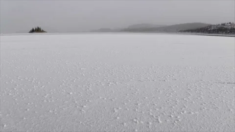 Drone view of snowy surface in winter, Northwest-Territories, Canada Stock Footage 244646691