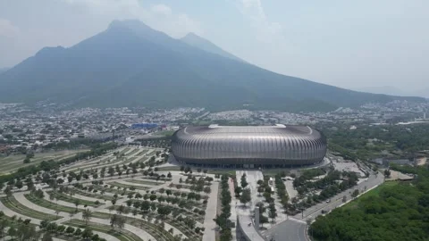 Drone View of Soccer Stadium with Mountains in Background in Monterrey Stock Footage 333789444