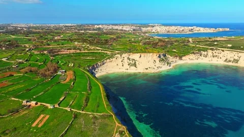 Drone view of south part of Maltese island. Cliffs, rocks, sea and green fields Stock Footage 329773710