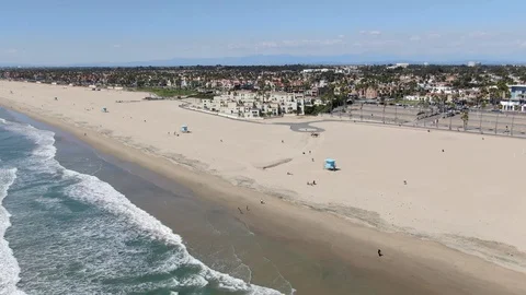 Drone view of sparsely populated beach in California during Coronavirus Video stock 127980638