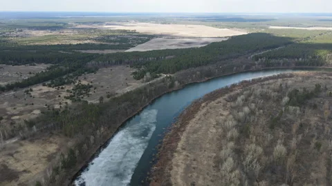 Drone view on spring thaw and Desna river in Ukraine. Bird's eye view of the Stock Footage 156524356