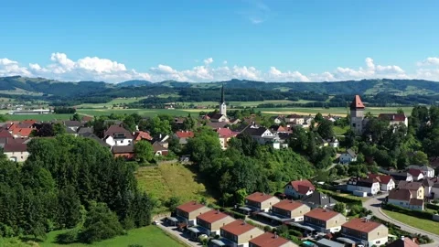 Drone view of the square in Hausmening, Austria. Old church in Tyrol Stock Footage 196125962