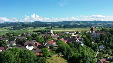 Drone view of the square in Hausmening, Austria. Old church in Tyrol Stock Footage 196128623