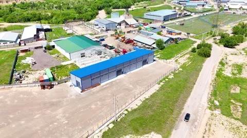Drone View of Standalone Warehouse Building With Industrial Yard Stock Footage 340041533