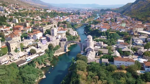 Drone view of "Stari most" iconic bridge in Mostar and Neretva river Stock Footage 166249943