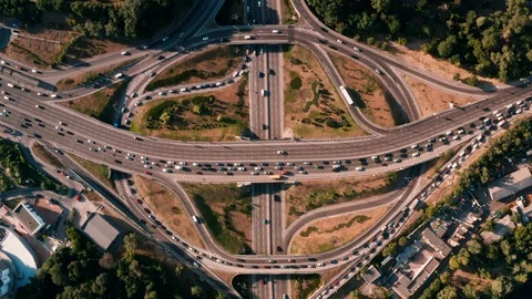 Drone view static video camera looks down at a road junction Stock Footage 111875879