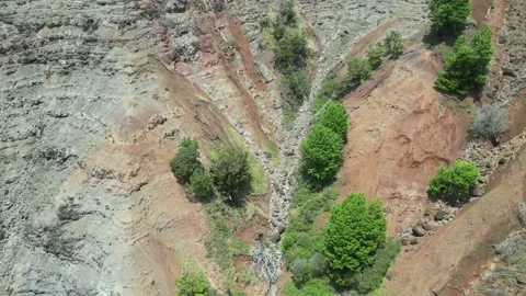 Drone view of a steep eroded canyon wall in Hawaii 動画素材 348263773