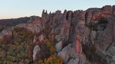 Drone View of Stone Cliffs Above Autumn Forest Video stock 333178015