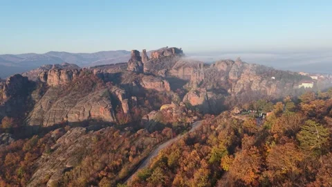 Drone View of Stone Cliffs Above Autumn Forest Video stock 333179122