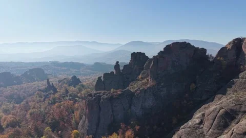 Drone View of Stone Cliffs Above Autumn Forest Video stock 333180709