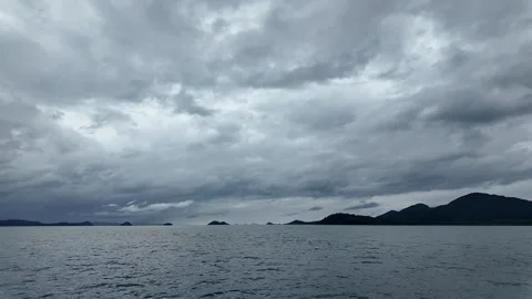 Drone view of stormy sky and islands over the sea  natures calm before the .. Stock Footage 311091964