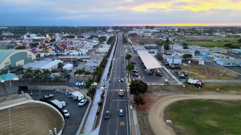 Drone view of street with light traffic shortly before sunset. 動画素材 162085633