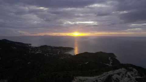 Drone view of stunning sunset at island in Asia, cloudy after the rain Stock Footage 320041998