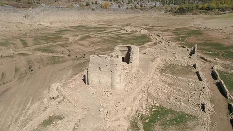 Drone view of a submerged old Castle visible after a severe draught Stock Footage 112301264
