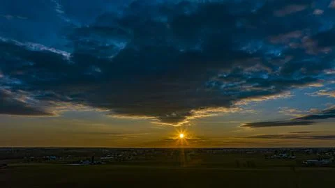 Drone View of a Sunset With Clouds, Red, Orange and Blue Sky Stock Photos