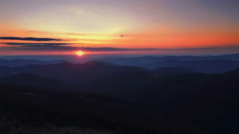 Drone view of sunset color sky over mountain silhouette. Stock Footage 151499113