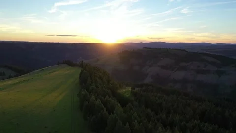 Drone view of sunset Over Clearwater River Canyon and farmlands in Idaho Video stock 171830001