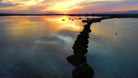 Drone view of the sunset over Santapola lagoons. Stock Footage 288612493