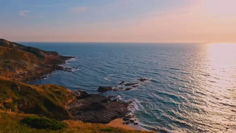Drone view of the sunset over the sea	 Stock Footage 252435453