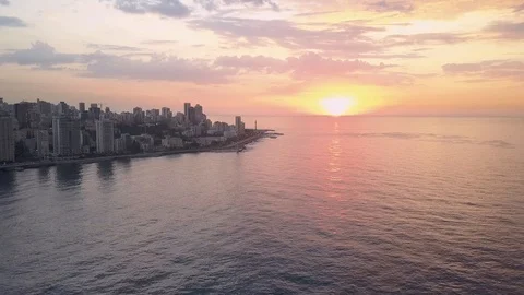 Drone view of sunset over the water In Beirut, Lebanon Stock-Footage 98037886